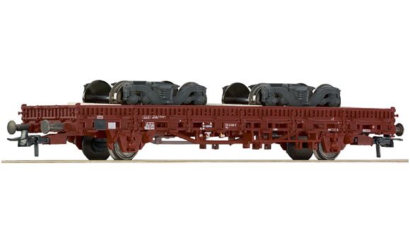 Plošinový vagon s nákladem - 2 ks podvozků