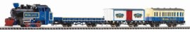 57142 PIKO - Vlak z divokého západu s parní lokomotivou, 3 x nákl. vůz, kolejivo s podložím, 12 x ob