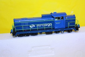 Poškozený (masky) model lokomotivy Cargo (HO)